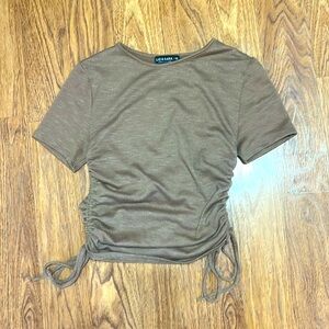 brown crop top with tied strings on the sides size medium